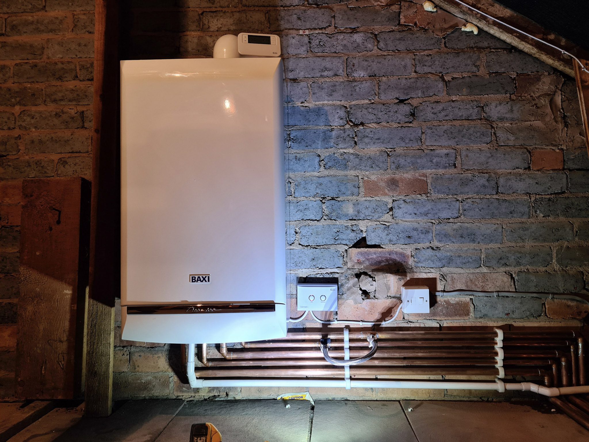A Baxi Duo-tec boiler fitted in a loft